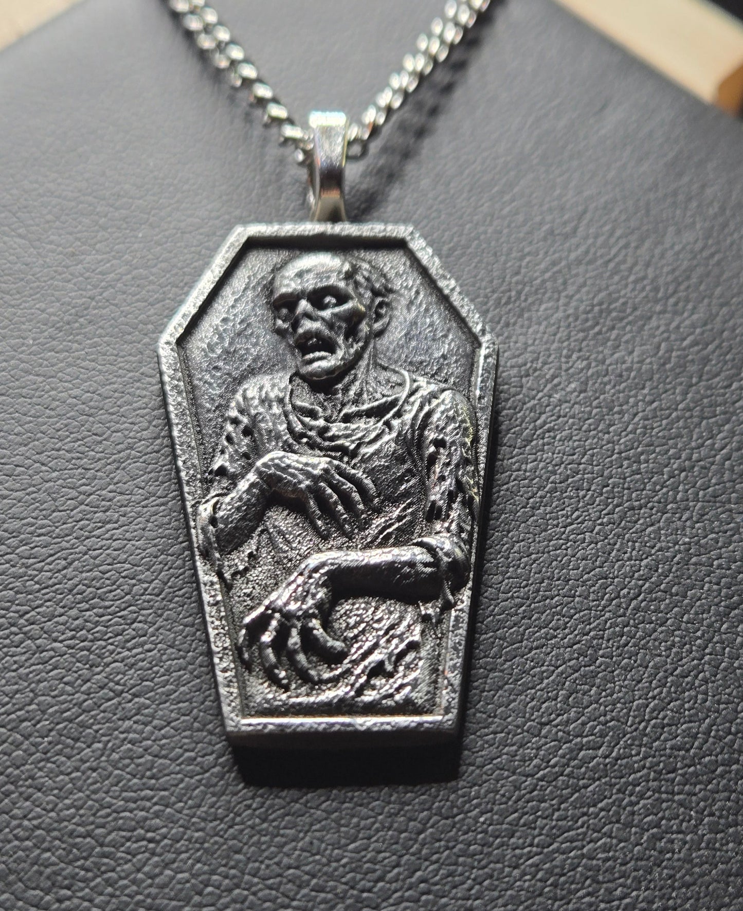 Handcrafted Coffin-Shaped Zombie Pendant