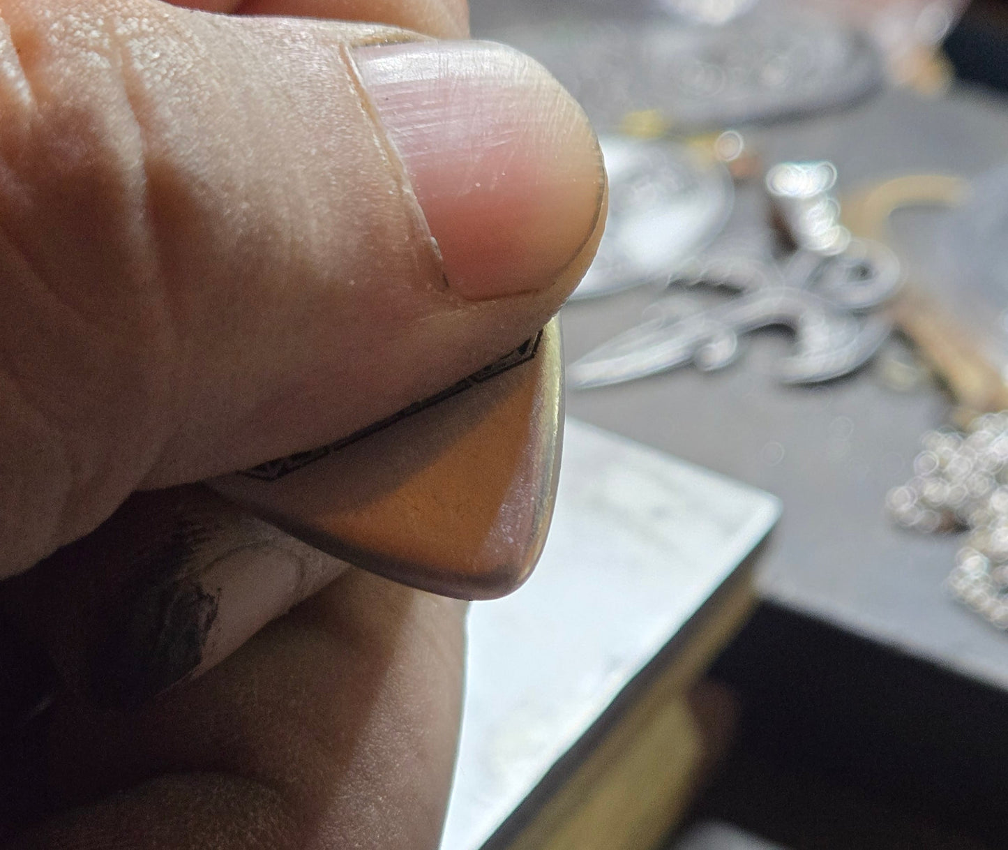 Custom Aluminum Guitar Pick – Custom Lament Configuration Design