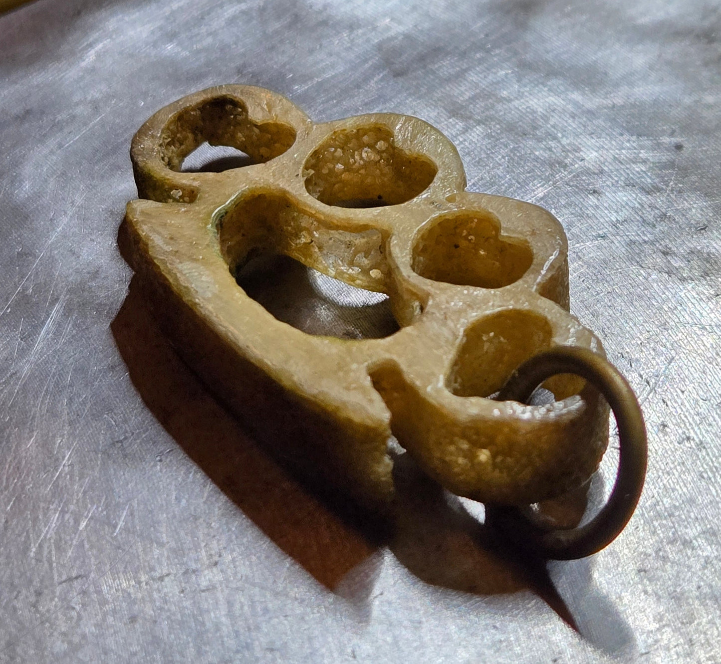 Hand-Carved Human Bone Mini Brass Knuckles – Heart Cutouts