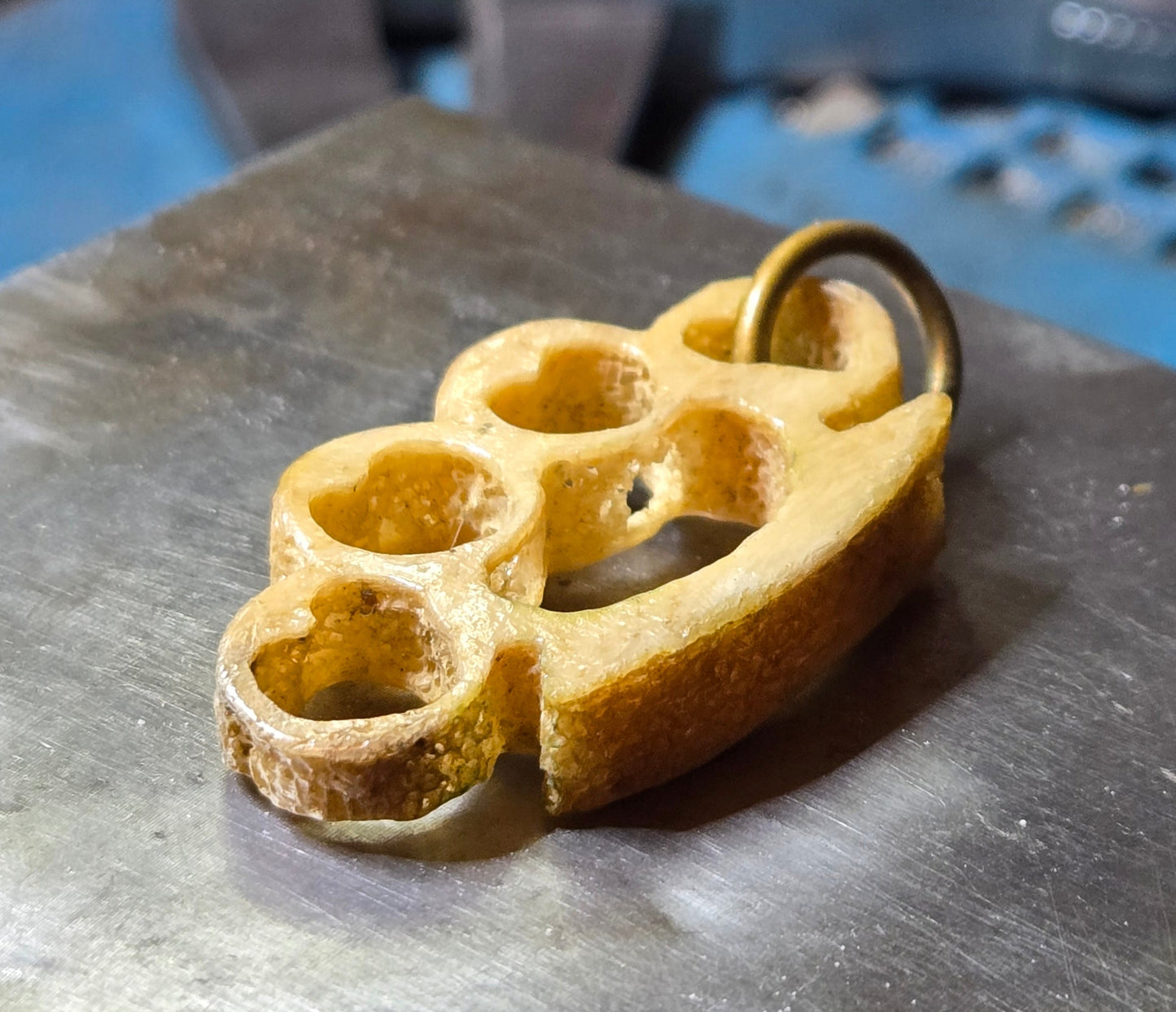 Hand-Carved Human Bone Mini Brass Knuckles – Heart Cutouts