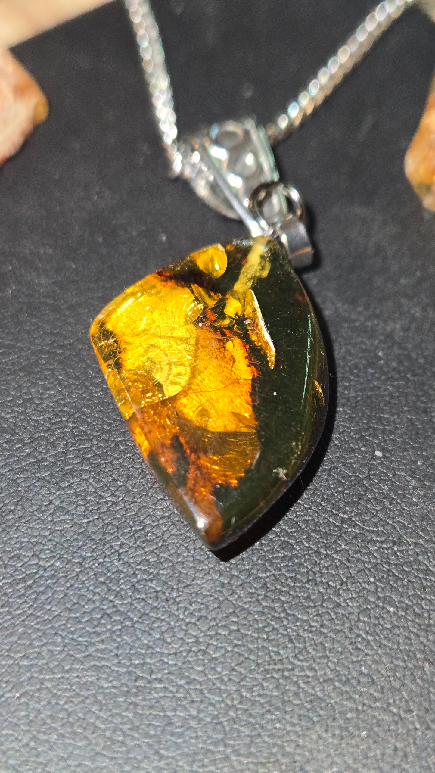 Hand-Polished Natural Amber Pendant With Organic Inclusions