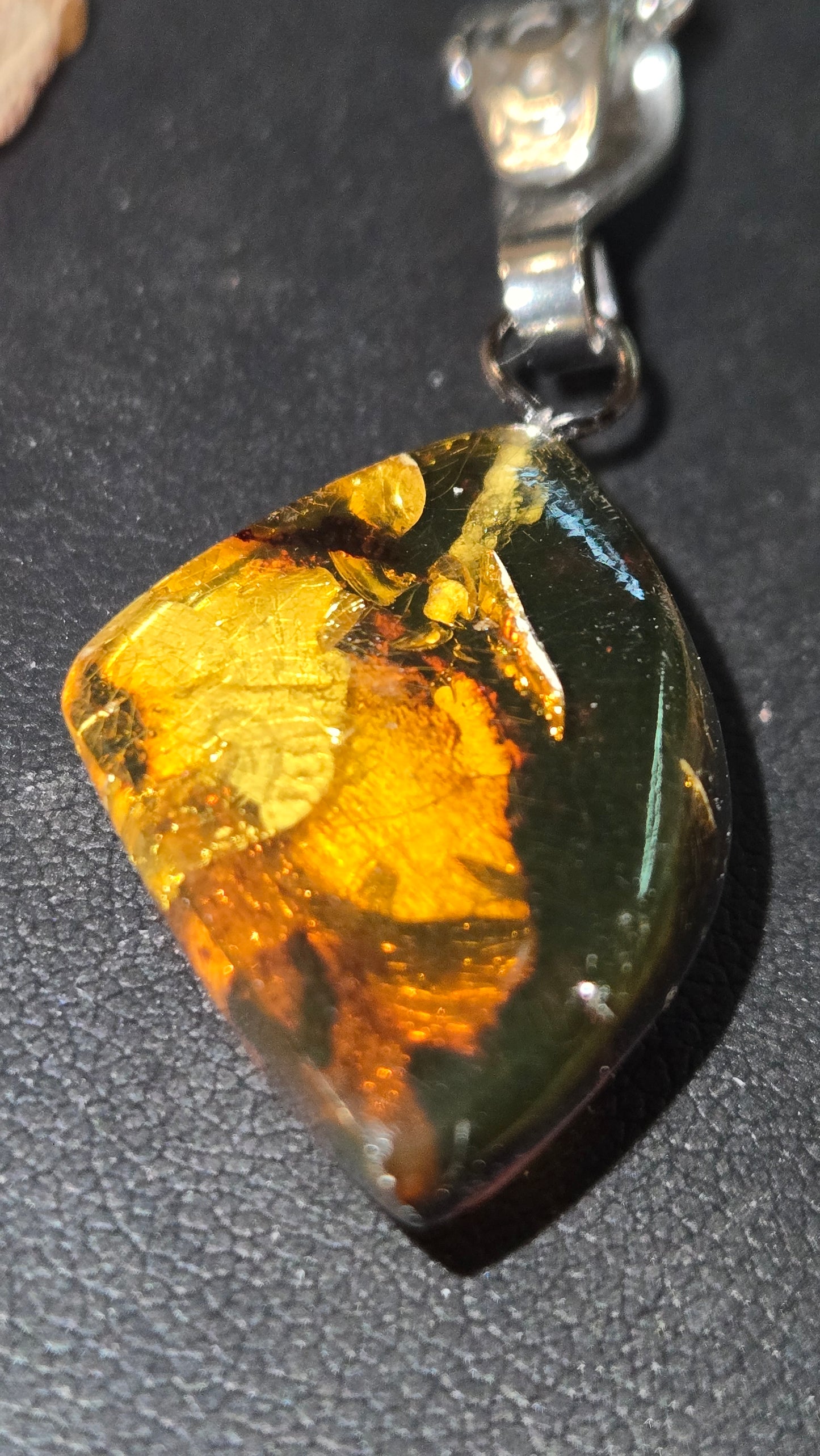 Hand-Polished Natural Amber Pendant With Organic Inclusions