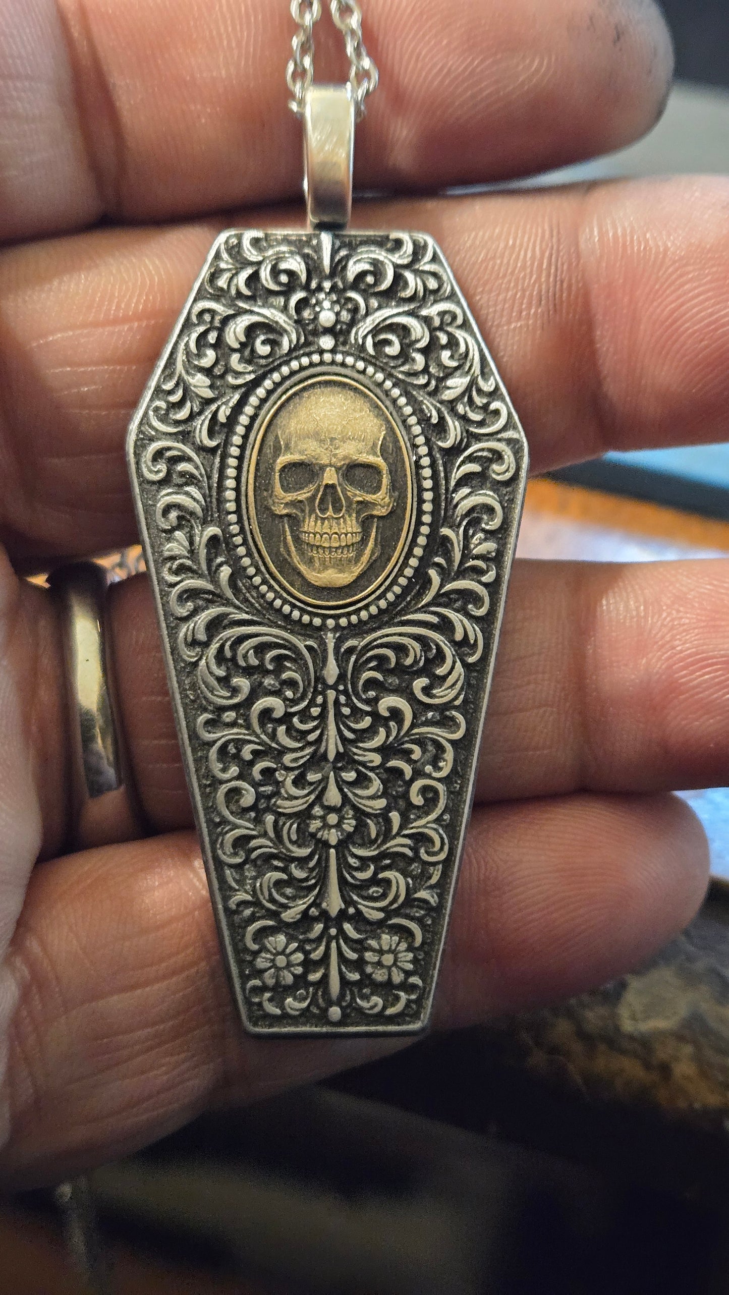 Filigree Coffin Necklace with Brass Skull Inlay